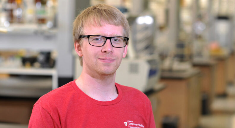 Photo of Cody Lauritsen in a lab.