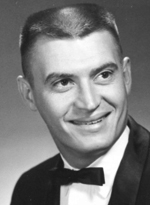 Black and whit photo of Norm. He's wearing a black suit jacket and bow tie.