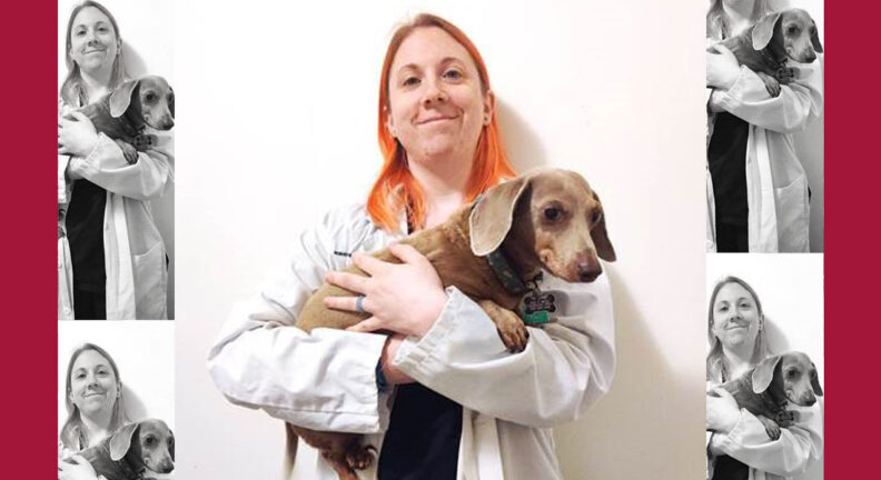 Tara Powers holding a Dachshund.