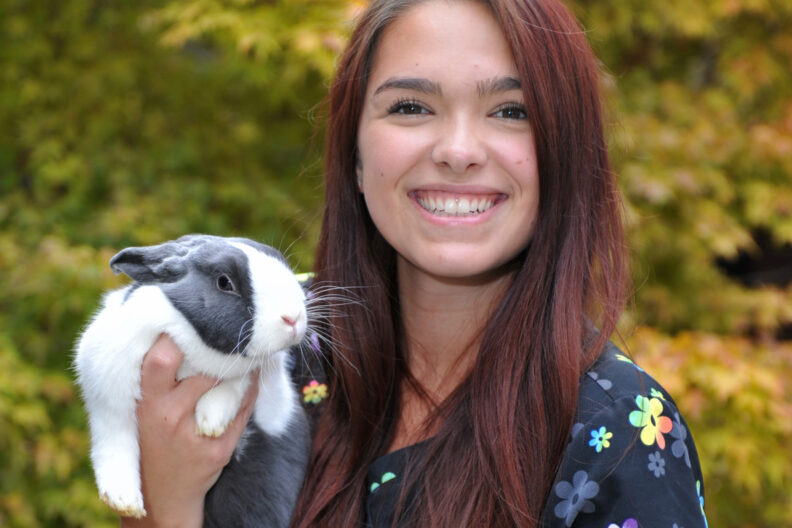 Tatiana holding her rabbit, Bugs Bunny.