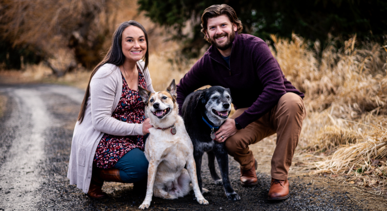 Matthew Mietchen with his wife and 2 dogs.