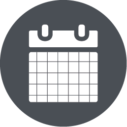 Calendar icon inside a dark grey circle.