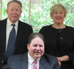 (front) Charles C. Mellinger III (back l-r) Charles’
father Charlie Mellinger and his sister Lisa Mellinger.