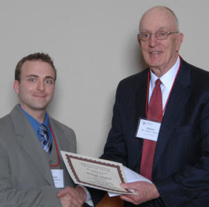 Nicholas Paulson (DVM ’12) receiving the first Class of ’61
Professionalism Award from Dr. Robert Wilson,
former dean of the college.