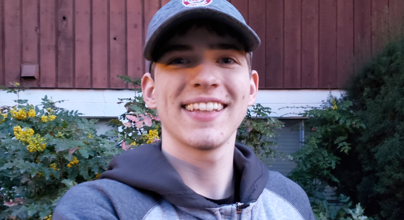 Thomas Ballinger standing outside.