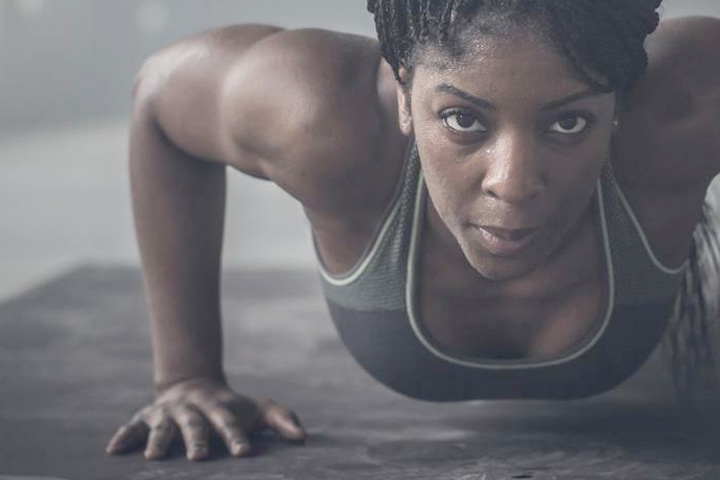 Woman doing push ups.