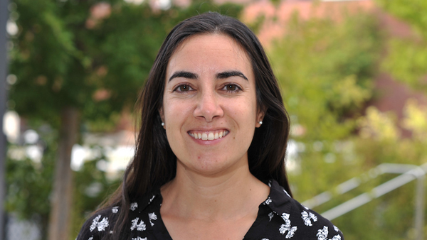 Dr. Fernandez outside on a summer day.