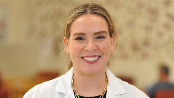 Lais Malavasi in the lobby of the Veterinary Teaching Hospital.