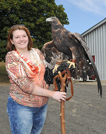 Dr. Finch outside the Stauber facility for raptors with Amicus.