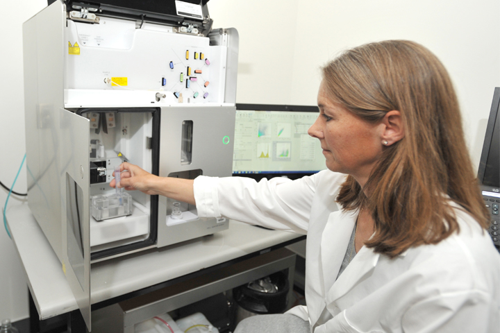Melissa Oatley working in a lab.