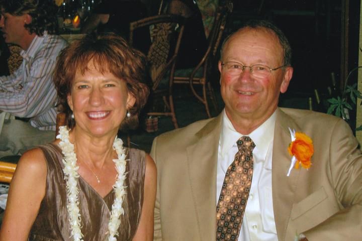 Cathy and Lanny dressed up at a reception.