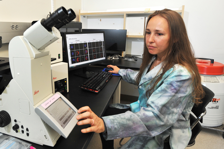 Dr. Heather Kohler working in a lab.