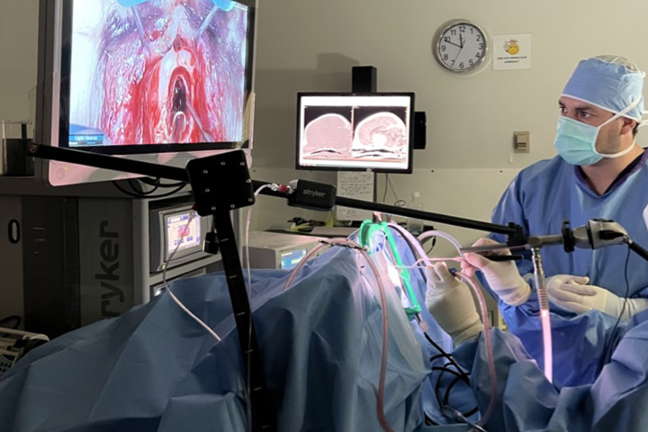 Dr. Valerio-Lopez assisting during a procedure.