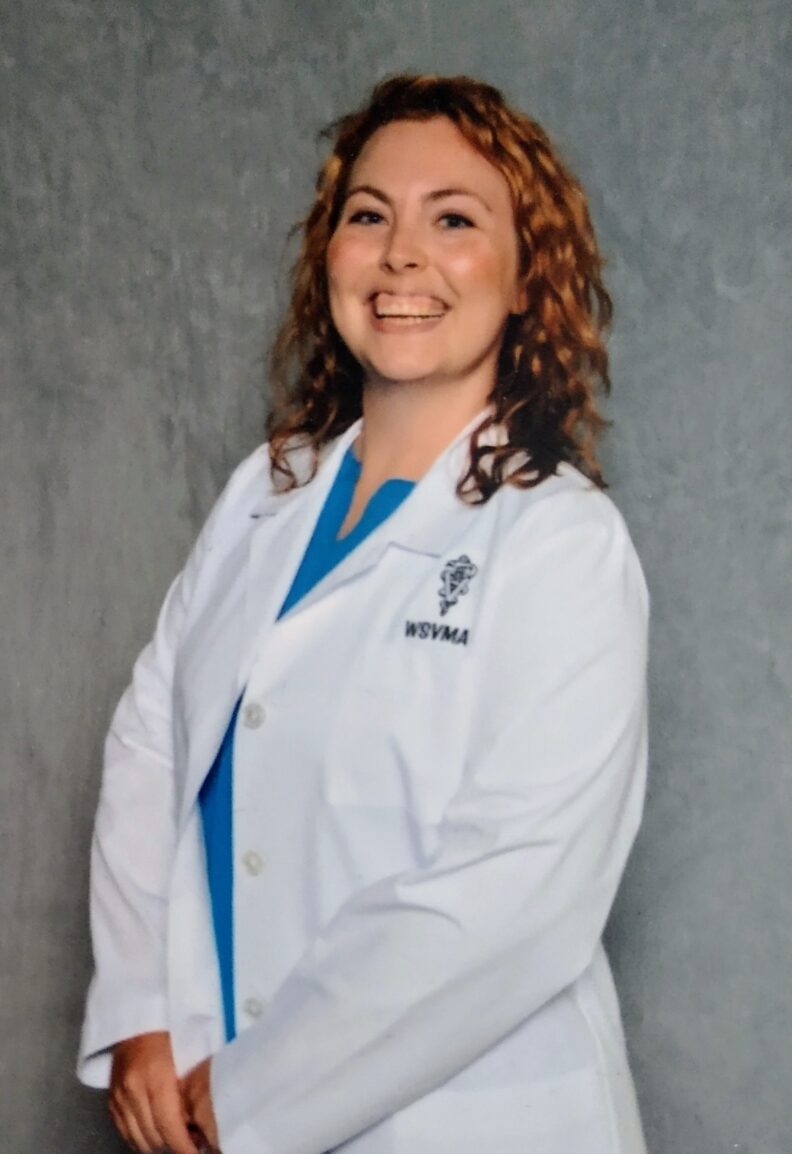 Joselyn wearing her white coat.