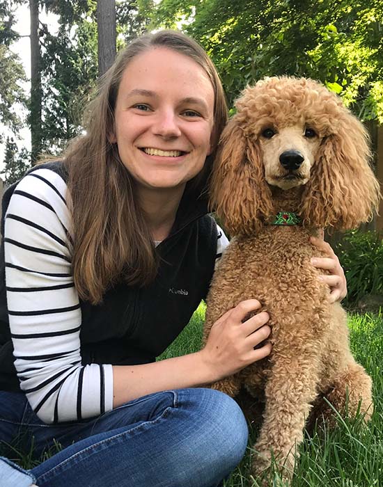 Grace with her butterscotch colored standard poodle.