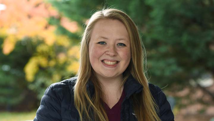 Emma outside Bustad Hall.