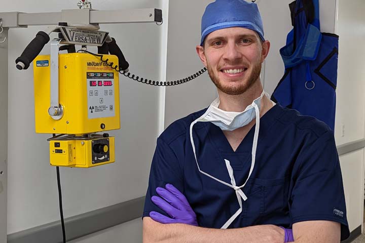 Josh Packer in scrubs.
