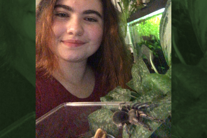 Madelynn with one of her tarantulas.