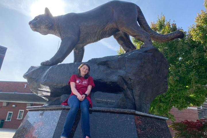 Katherine on the WSU "Butch" statue outside Martin Stadium.
