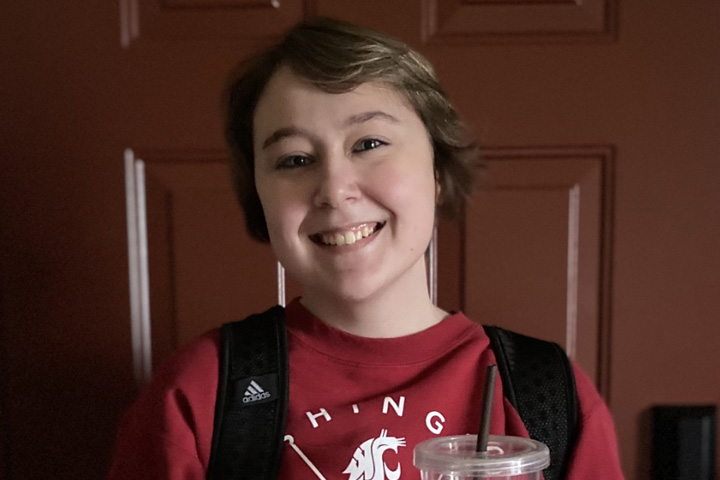 Hannah wearing her Coug gear.