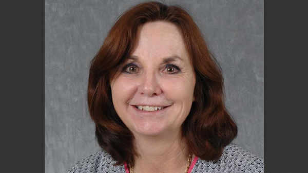Professional headshot of Shelley Ensign.
