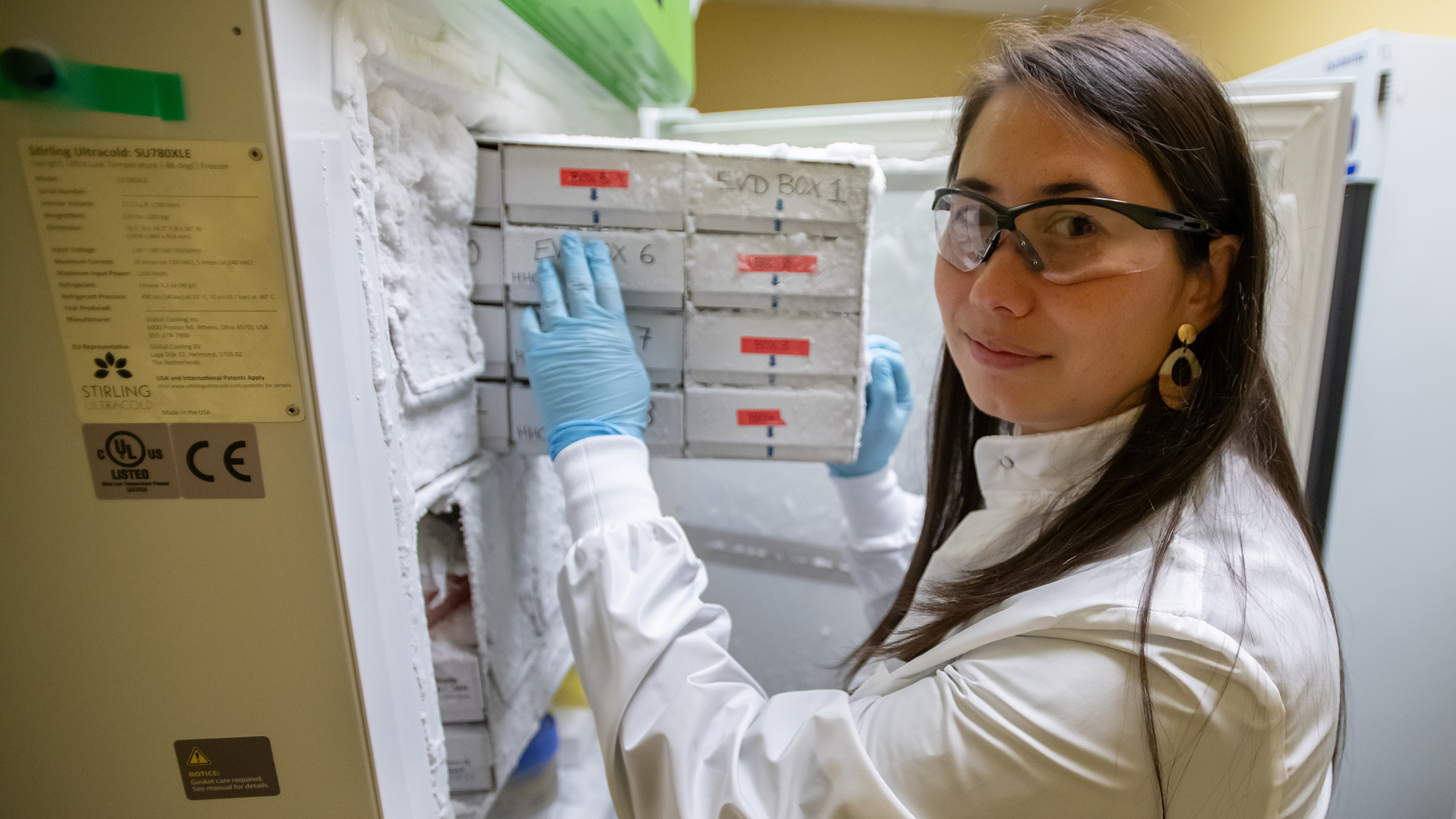 Bonnie Gunn removing samples from a freezer.
