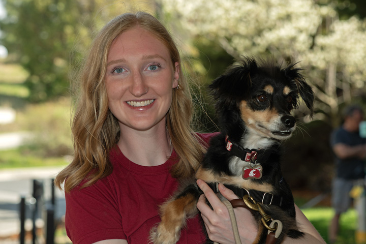 Brittany holding her dog, Ralph, outside the Teaching Hospital.