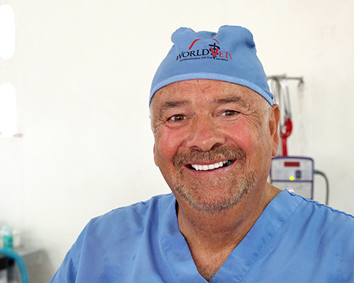 Dr. Jerry Brown in scrubs.