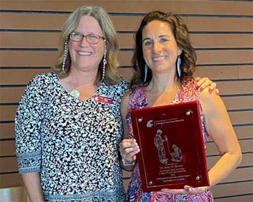 Jerry Brown's daughter receiving her father's award.