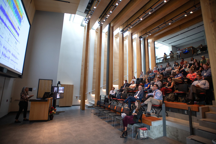 Wide angle shot of the auditorium during a presentation.