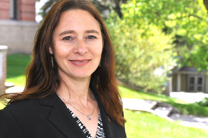 Allison standing outside on a beautiful sunny day.