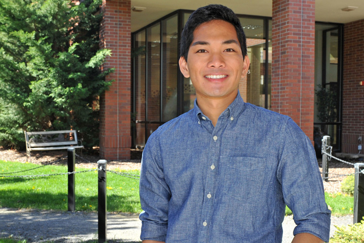 Josh standing in front of the WSU veterinary teaching hospital.