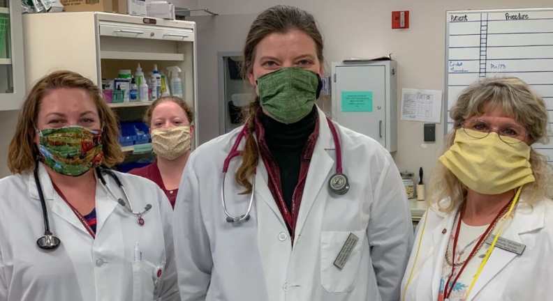 Wearing donated cloth masks