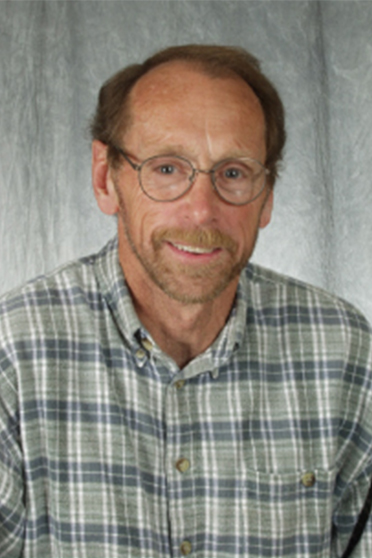 Studio photo of Paul Johnson.