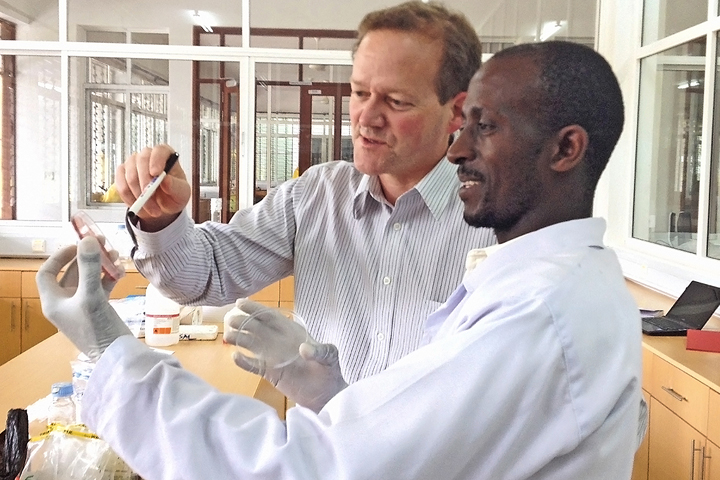 Dr. Douglas Call (left) with Beatus Lyimo, a graduate student at the Nelson Mandela African Institution for Science and Technology. They are working in the lab at the Mandela Institution where Dr. Call and his team process samples to analyze for antibiotic resistance.