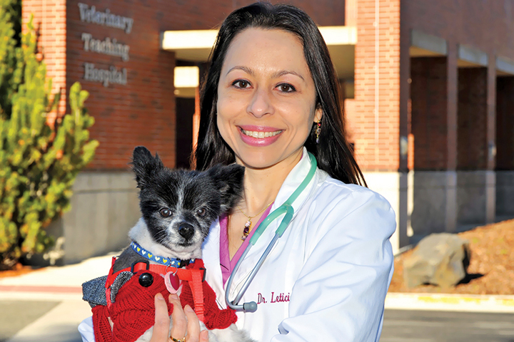 Veterinary behaviorist Leticia Fanucchi, outside the main entrance of the Veterinary Teaching Hospital.