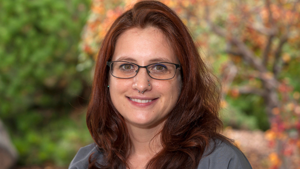 Joyce outside the Veterinary Teaching Hospital.