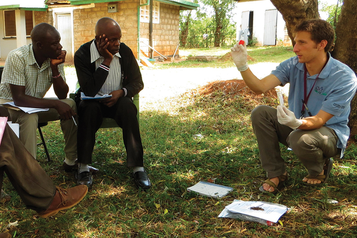 (right) Matt Sammons (’16 DVM) training community interviewers and animal health technicians in Kenya.