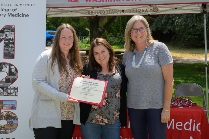 The Paul G. Allen School grant team standing with Dean Dori.