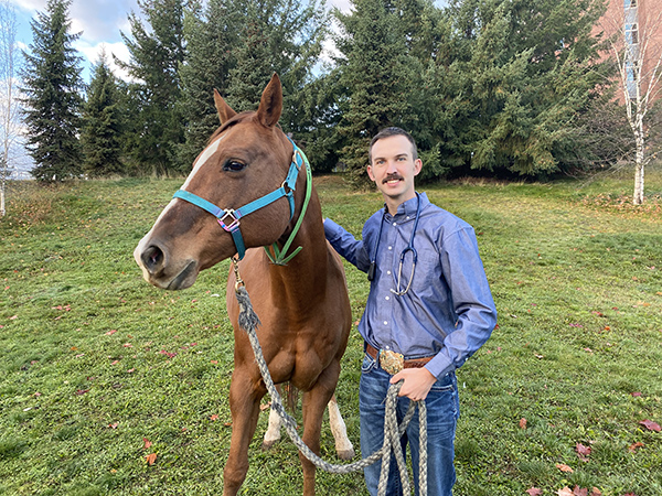 Veterinary student with horse