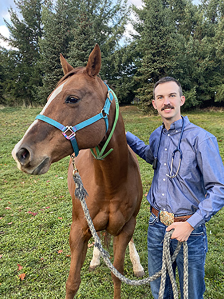 DVM student with horse
