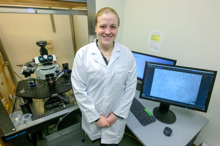 Graduate student Lydia Bailey in a lab.