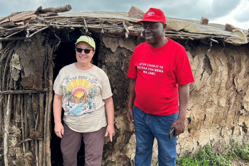Dr. Gretchen Zarle stands with Dr. Imán Mbizi while visiting Tanzania.