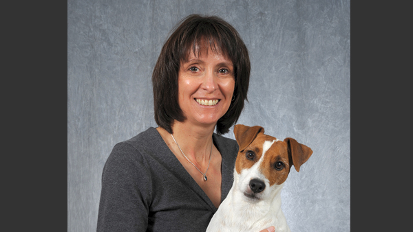 Katrina in the photo studio with her dog.