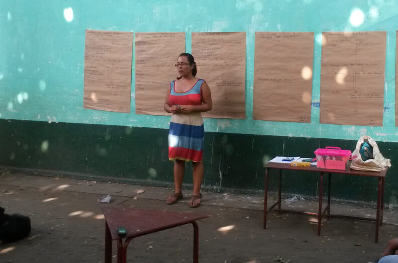 Maria Ortiz giving a presentation.