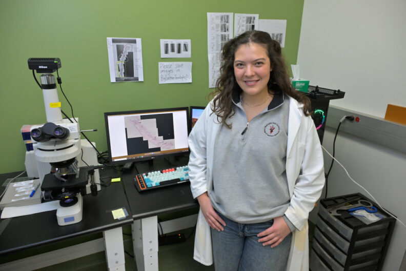 EschLEAD scholar GiGi Searle poses in the lab.