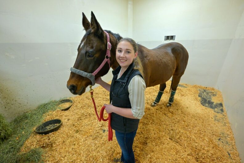 Melanie Moore with a horse.
