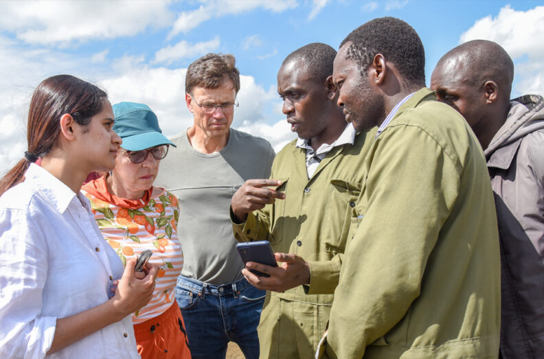 Dr. Ng'etich explaining to colleagues how the assessment works.