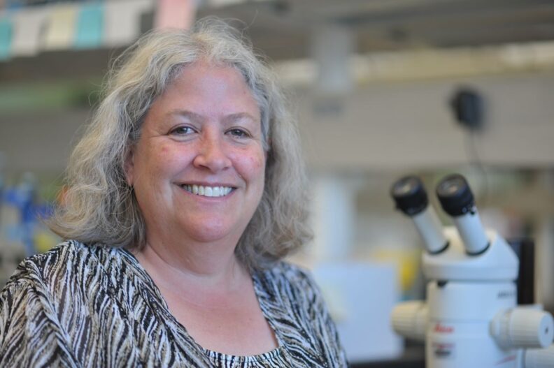Dr. Jennifer Watts poses in her lab.