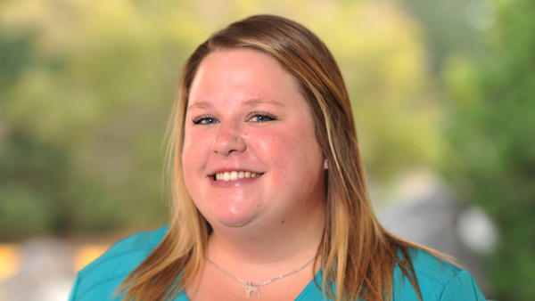 Kasey outside the Vet Hospital on a nice summer day.